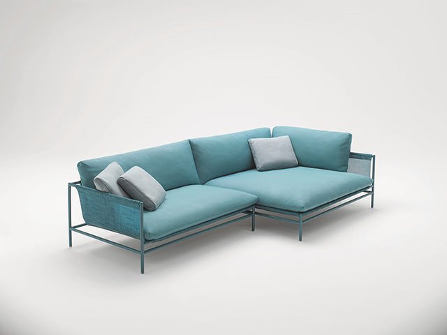 Three seater L bend blue color sofa