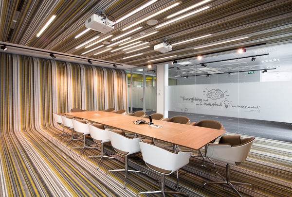 Conference table space which the floor design stretch to the wall