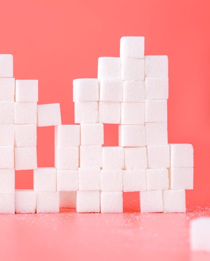 Portrait of sugar cubes stacked